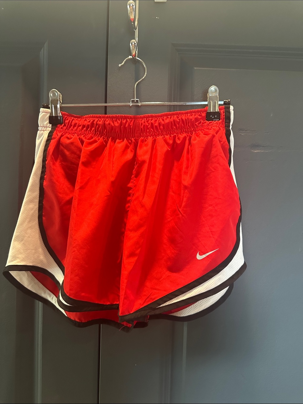 Nike Women’s Red Athletic Shorts with White Side Panels and Black Trim